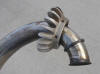 This is the unique exhaust pipe for the R50S BMW motorcycle.  It has the finned nut and the end with a flange.  These are very hard to find in good condition because there is no way to get the finned nut on or off.  It is captured just like the R50/R60 type.  Photo by James Young, thanks.  