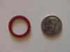 This photo shows the red Everbest gasket as compared to a dime.
