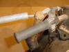 This shows how to slide the pipe over the bent lever and use a hammer handle to straighten a Magura lever.