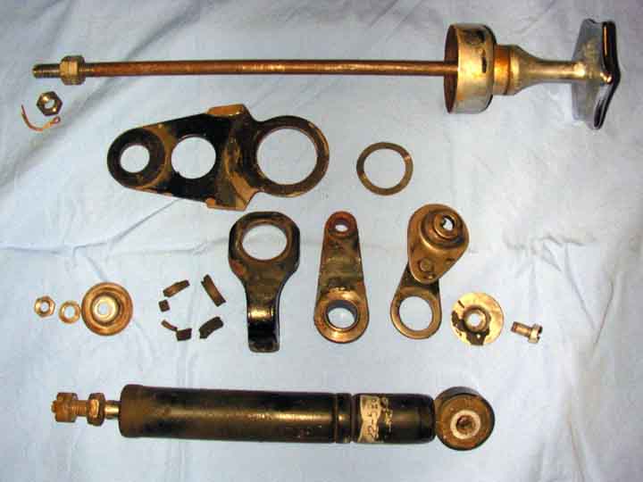 This shows the disassembled parts of the BMW motorcycle hydraulic steering damper for the R69S.