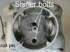 This shows the two bolts that mount the shifter forks on the inside of the transmission. 
